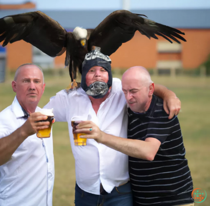 A group of men with a bird on their head