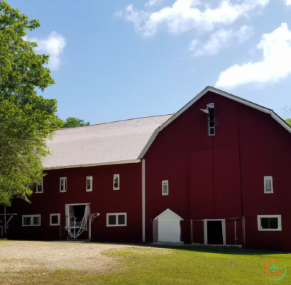 A red barn with a white door