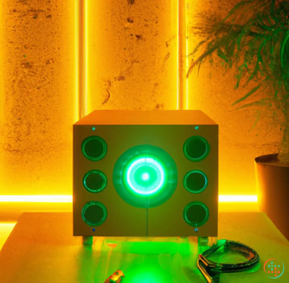A green and black speaker
