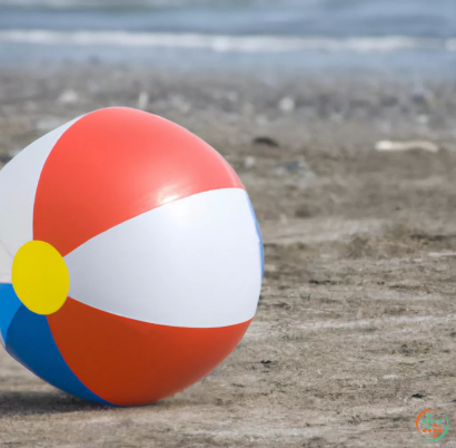 A beach ball on the sand