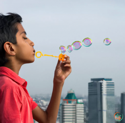 A person blowing bubbles