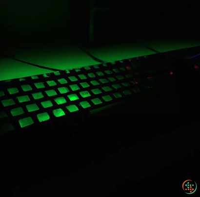 A keyboard with green lights