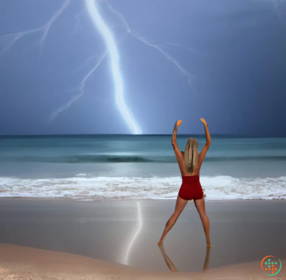 A person doing a handstand on a beach