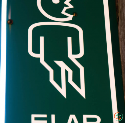 A green and white sign