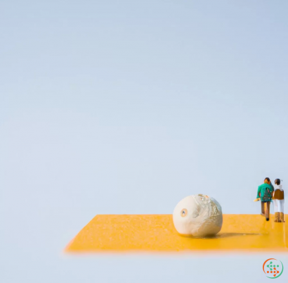 A couple of people standing on a wooden surface with a white ball