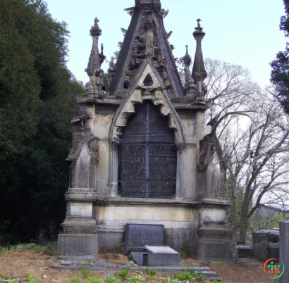 A stone building with a cross on top