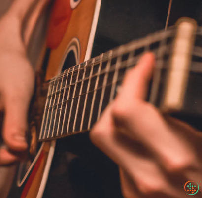 A person playing a guitar