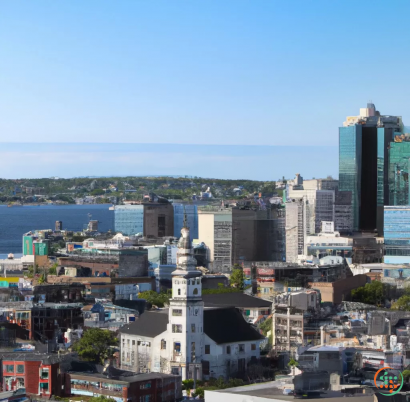 A city with tall buildings and a body of water in the background