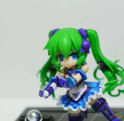 A toy figurine of a girl with a green hair and a blue dress