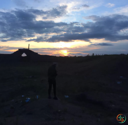 A person standing on a hill