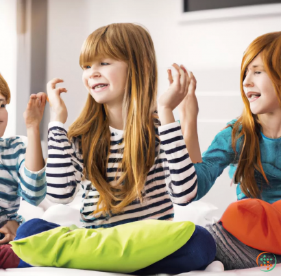 A group of girls sitting on the floor and laughing