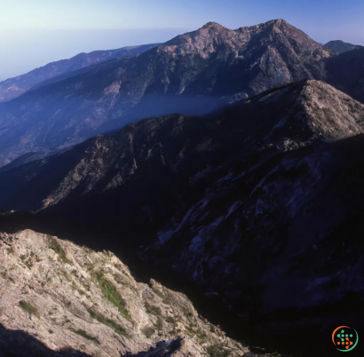 A mountain range with a river running through it