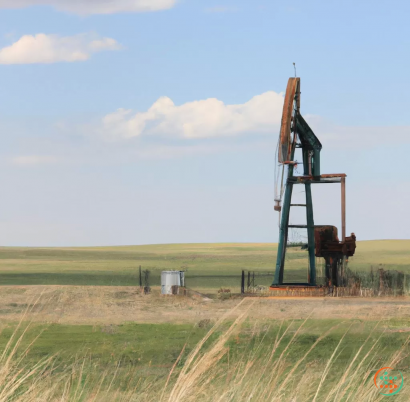 A large metal tower in a field