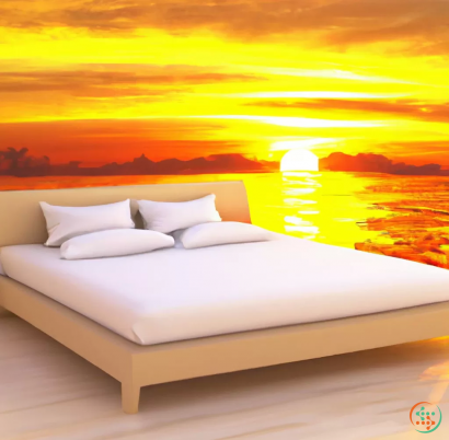 A bed with pillows and a sunset