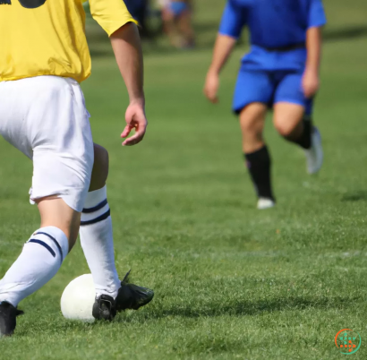 A group of people playing football