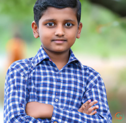 A young boy with his arms crossed