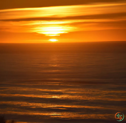 A sunset over a large body of water