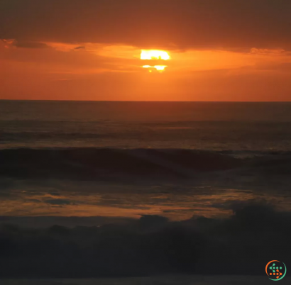 A sunset over a large body of water