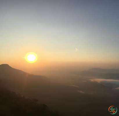 A sunset over a mountain range