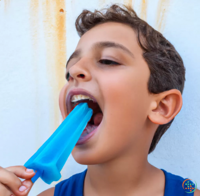 A kid brushing his teeth